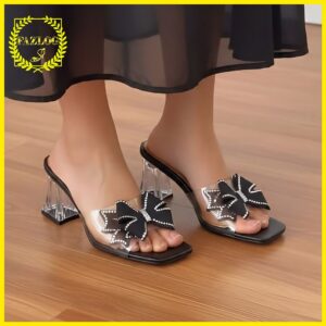 کفش صندل مجلسی زنانه طلقی پاشنه شیشه‌ای طرح گل